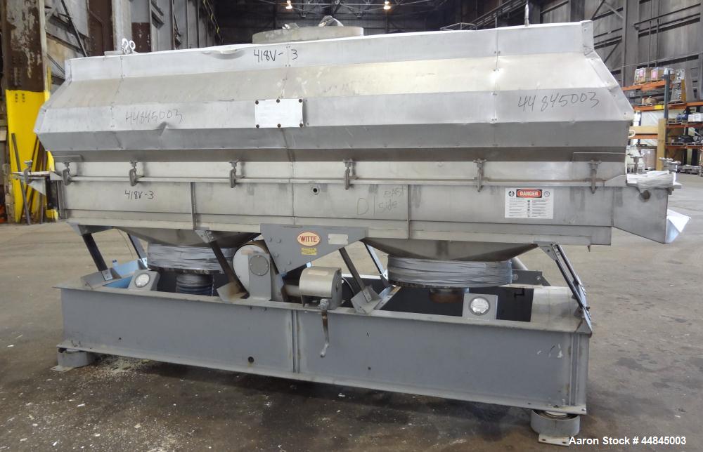 Used Witte Vibrating Fluid Bed Dryer, 304 Stainless Steel, 144" long x 24" wide bed with slotted screen. Clamp on top cover with (1) 30" x 16" oval top air outlet, (2) 9" bottom air inlets. Design ra...