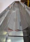 Used Carrier Vibrating Equipment Dryer/Cooler, Model FCAD-12100S, 304 Stainless Steel. 11’’ wide x 135’’ long trough, approximately 120’’ long section with a perforated “W” shaped deck. Top end feed,...