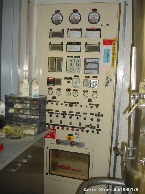 Used Glatt Fluid Bed Dryer/Coater, Model GPCG5. Stainless steel construction with spray granulation and drying inserts, 2 bar shock rating, 5.5 kw blower, 460 volt, steam heated with control panel, s...