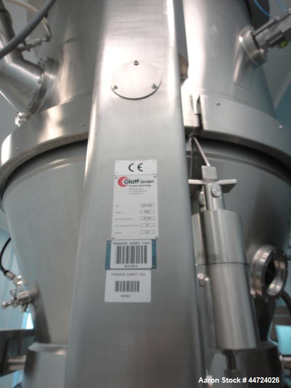 Used Glatt model WST500 stainless steel fluid bed dryer. Approximate total volume 12.5cumt, approximate container volume 1,560 litre. Maximum pressure at 10 bar design. Unit includes top mounted dust...