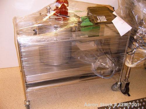 Used GEA Aeromatic-Fielder T/SG4 Fluid Bed Spray Dry Granulator, built in 1993. Batch size 220 lbs (100 kg). Through the wall GMP design, all stainless steel, 145 psi (10 bar) impulse pressure rating...