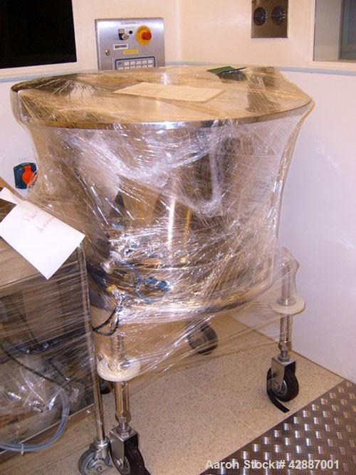 Used GEA Aeromatic-Fielder T/SG4 Fluid Bed Spray Dry Granulator, built in 1993. Batch size 220 lbs (100 kg). Through the wall GMP design, all stainless steel, 145 psi (10 bar) impulse pressure rating...