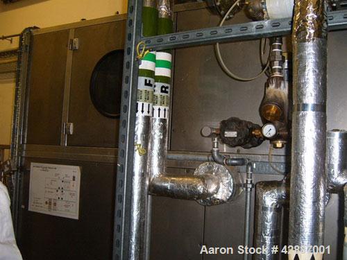 Used GEA Aeromatic-Fielder T/SG4 Fluid Bed Spray Dry Granulator, built in 1993. Batch size 220 lbs (100 kg). Through the wall GMP design, all stainless steel, 145 psi (10 bar) impulse pressure rating...