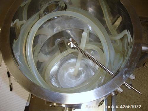 Used Glatt Fluid Bed Dryer, Model GPCG 2, Stainless Steel. 6.5 Bar internal shock rating, (2) spray granulation inserts, (1) Wurster insert, integrally mounted control panel with humidificatin cabine...