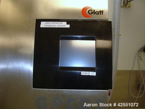 Used Glatt Fluid Bed Dryer, Model GPCG 2, Stainless Steel. 6.5 Bar internal shock rating, (2) spray granulation inserts, (1) Wurster insert, integrally mounted control panel with humidificatin cabine...
