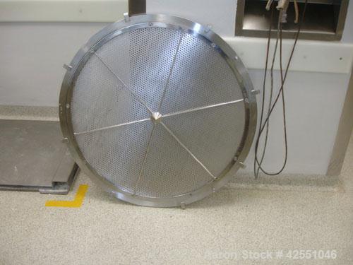 Used Glatt Fluid Bed Dryer, Model GPCG120, Stainless Steel. 2 Bar internal shock rating, spray granulation insert with (3) bowls and (2) bowl carts with top spray gun, Wurster insert with expansion c...