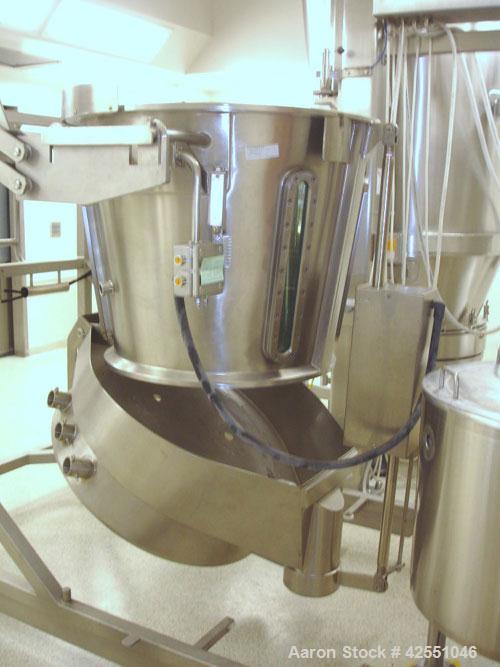 Used Glatt Fluid Bed Dryer, Model GPCG120, Stainless Steel. 2 Bar internal shock rating, spray granulation insert with (3) bowls and (2) bowl carts with top spray gun, Wurster insert with expansion c...