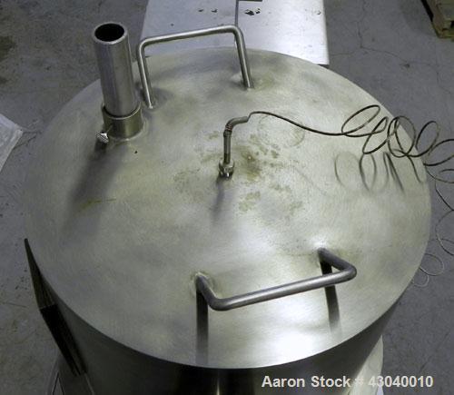 Used Glatt LabSpray Passive Flow Spray Dryer, Model PFSD 100, 304 Stainless Steel. Main drying chamber 14’’ diameter x 25’’ deep with cover, and a side sight glass. Bottom collection area. Includes a...