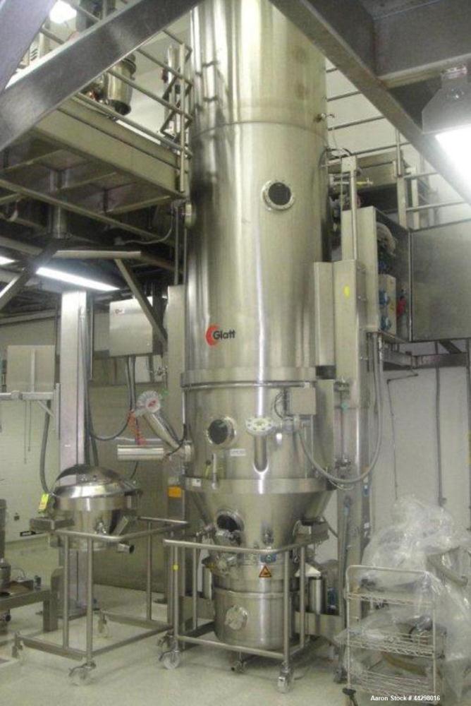 Used Glatt Fluid Bed Dryer Granulator, Model WSG 60, stainless steel construction, 2 bar shock rating, with (2) two spray granulation chambers with expansion chambers and bowls on carts, Rexroth hyra...