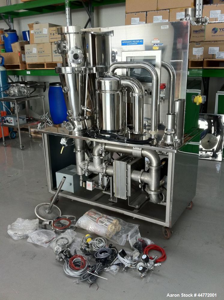 Used Niro MP-1 Multi-Processor Fluid Bed Dryer, stainless steel construction.  Capacity from 0.5 - 6 kg of product per batch.  Product container capacity 20 liters.  Maximum batch weight 7.5 kg.  Mac...
