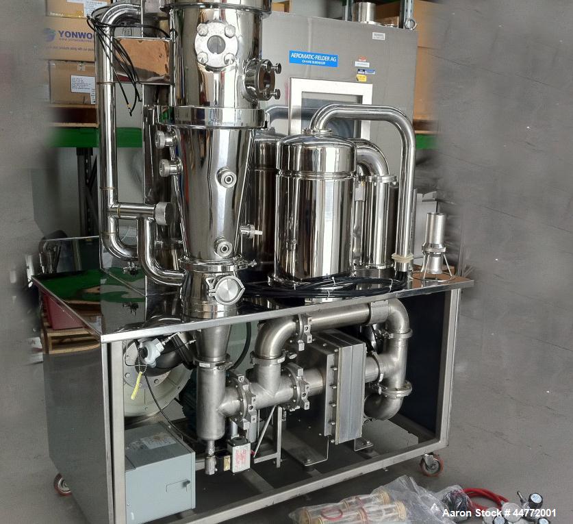 Used Niro MP-1 Multi-Processor Fluid Bed Dryer, stainless steel construction.  Capacity from 0.5 - 6 kg of product per batch.  Product container capacity 20 liters.  Maximum batch weight 7.5 kg.  Mac...