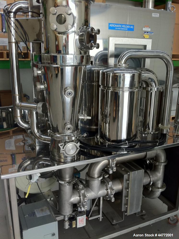 Used Niro MP-1 Multi-Processor Fluid Bed Dryer, stainless steel construction.  Capacity from 0.5 - 6 kg of product per batch.  Product container capacity 20 liters.  Maximum batch weight 7.5 kg.  Mac...