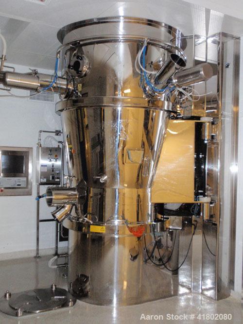 Used Niro Fluid Bed Dryer/Granulator, Model MP7-F1, Stainless Steel. Rated 10 bar maximum pressure, 1,610 liters. Includes a 75 hp blower, CIP system, air handling unit, Flanders air filtration unit,...