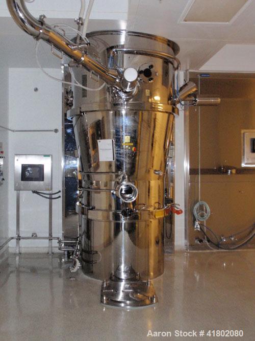 Used Niro Fluid Bed Dryer/Granulator, Model MP7-F1, Stainless Steel. Rated 10 bar maximum pressure, 1,610 liters. Includes a 75 hp blower, CIP system, air handling unit, Flanders air filtration unit,...