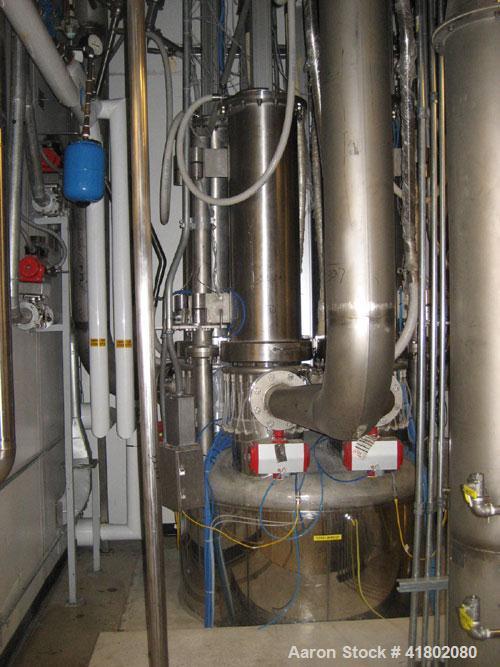 Used Niro Fluid Bed Dryer/Granulator, Model MP7-F1, Stainless Steel. Rated 10 bar maximum pressure, 1,610 liters. Includes a 75 hp blower, CIP system, air handling unit, Flanders air filtration unit,...