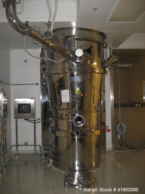 Used Niro Fluid Bed Dryer/Granulator, Model MP7-F1, Stainless Steel. Rated 10 bar maximum pressure, 1,610 liters. Includes a 75 hp blower, CIP system, air handling unit, Flanders air filtration unit,...
