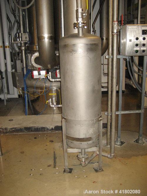 Used Niro Fluid Bed Dryer/Granulator, Model MP7-F1, Stainless Steel. Rated 10 bar maximum pressure, 1,610 liters. Includes a 75 hp blower, CIP system, air handling unit, Flanders air filtration unit,...