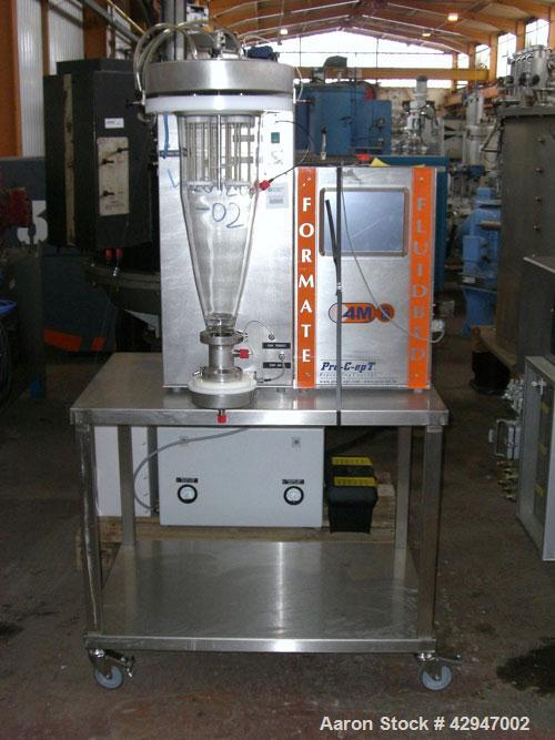 Used Pro-C-Ept Fluid Bed Dryer/ Granulator, Model 4M8, (1) 2 Liter glass chamber, top entry dust filter and spray attachment. Maximum air temperature 95 Degrees C. Includes an air heater and filter, ...