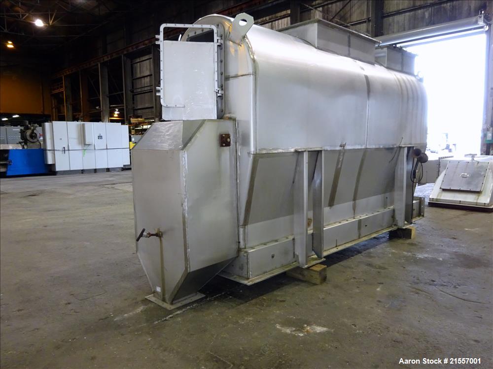 Used Scott Fluid Bed Dryer, Stainless Steel. Approximate 32" wide x 13' long, approximately 32 square feet of drying area. Includes cover.