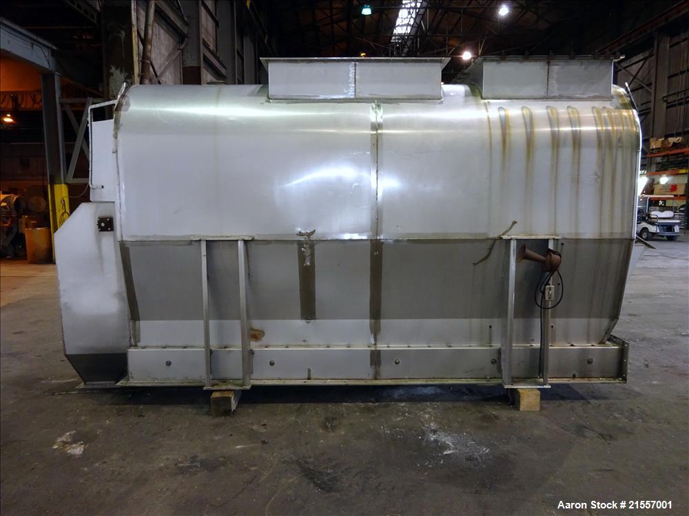 Used Scott Fluid Bed Dryer, Stainless Steel. Approximate 32" wide x 13' long, approximately 32 square feet of drying area. Includes cover.