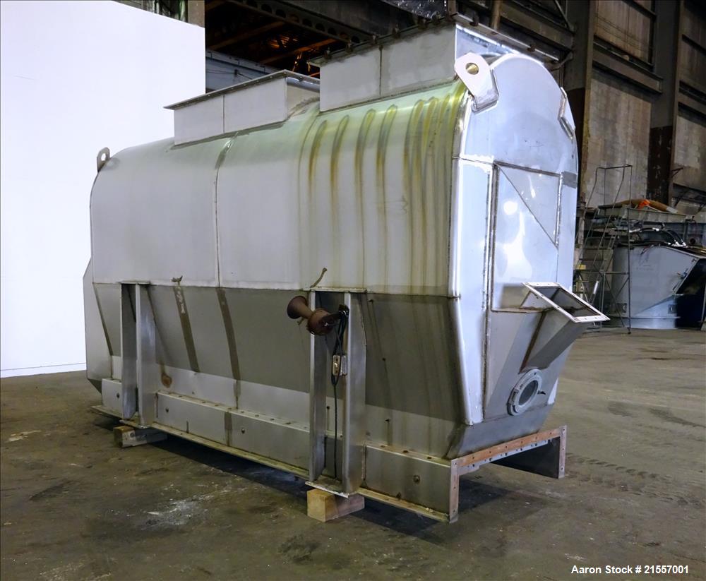 Used Scott Fluid Bed Dryer, Stainless Steel. Approximate 32" wide x 13' long, approximately 32 square feet of drying area. Includes cover.