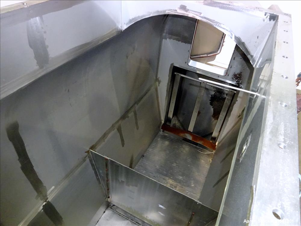 Used Scott Fluid Bed Dryer, Stainless Steel. Approximate 32" wide x 13' long, approximately 32 square feet of drying area. Includes cover.