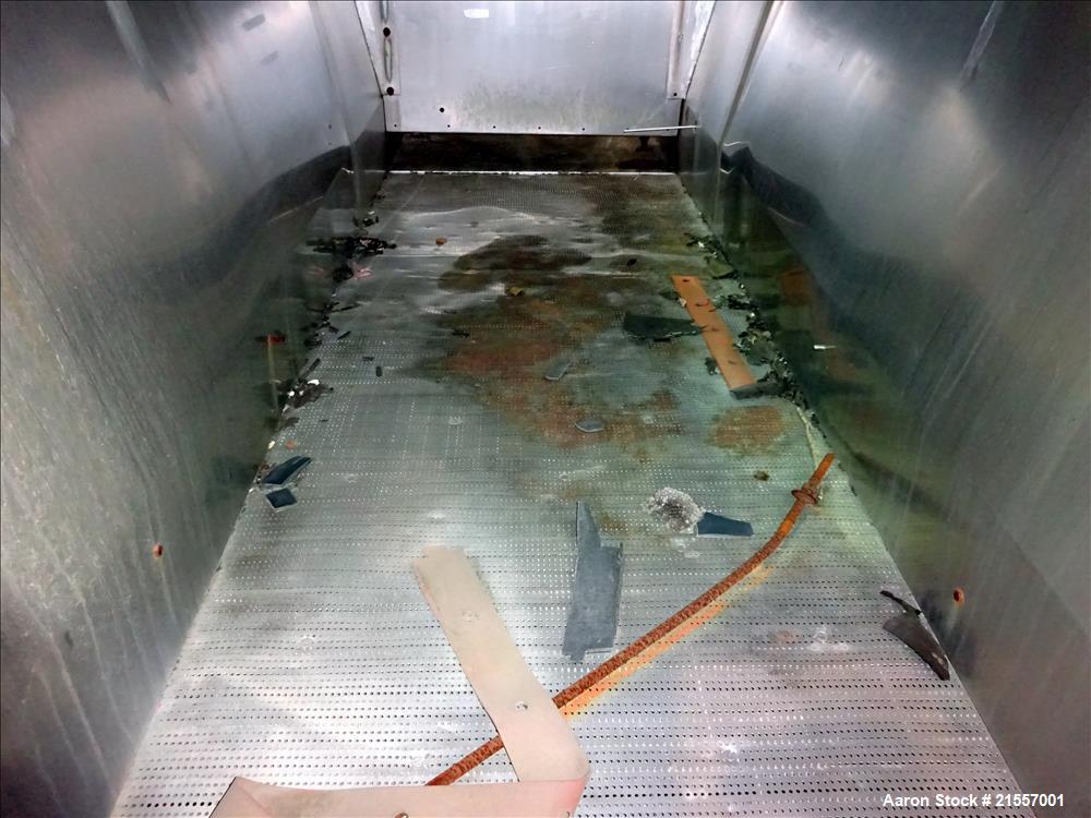 Used Scott Fluid Bed Dryer, Stainless Steel. Approximate 32" wide x 13' long, approximately 32 square feet of drying area. Includes cover.