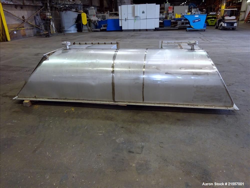 Used Scott Fluid Bed Dryer, Stainless Steel. Approximate 32" wide x 13' long, approximately 32 square feet of drying area. Includes cover.