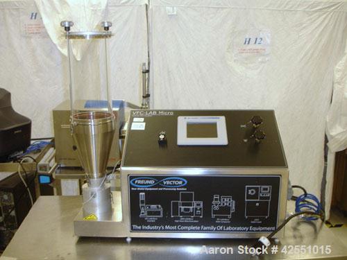 Used Vector Lab Micro Fluid Bed Dryer, Model MFL.01. Designed for wurster coating and top spray granulation, 100-600 gram spray granulation capacity, 25-100 degrees C temperature range with dust filt...