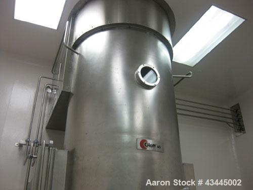 Used GLATT MODEL WSG120 STAINLESS STEEL FLUID BED DRYER. UNIT INCLUDES (3) STAINLESS STEEL MOBILE PRODUCT CONTAINERS, (1) FAN RATED 6000CUMT/HOUR. (1) HYDRAULIC POWERPACK. INCLUDES SWITCHGEAR CONTROL...