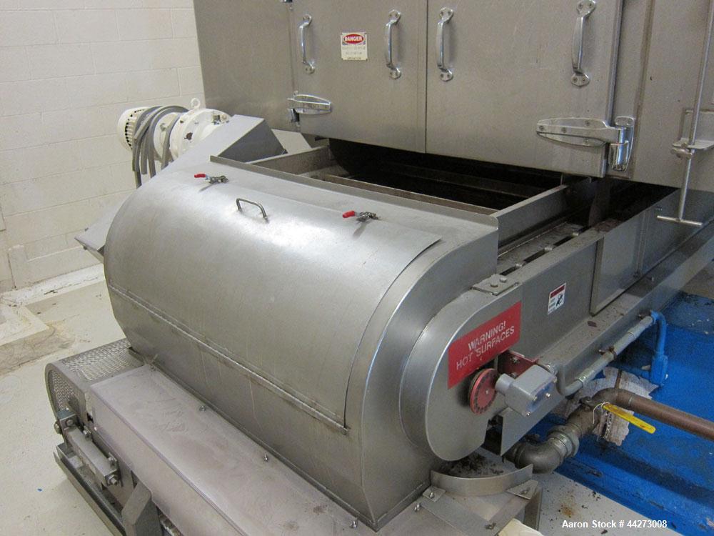 Used Wolverine Jetzone Fluidbed Dryer. Cleated Belt Stainless Steel. Approximate 36'' Wide. Serial No. 36