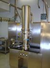 Used Glatt Fluid Bed Dryer, Model GPCG 2, Stainless Steel. 6.5 Bar internal shock rating, (2) spray granulation inserts, (1) Wurster insert, integrally mounted control panel with humidificatin cabine...
