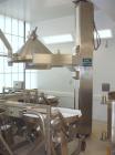 Used Glatt Fluid Bed Dryer, Model GPCG120, Stainless Steel. 2 Bar internal shock rating, spray granulation insert with (3) bowls and (2) bowl carts with top spray gun, Wurster insert with expansion c...