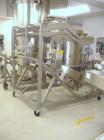 Used Glatt Fluid Bed Dryer, Model GPCG120, Stainless Steel. 2 Bar internal shock rating, spray granulation insert with (3) bowls and (2) bowl carts with top spray gun, Wurster insert with expansion c...