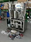 Used Niro MP-1 Multi-Processor Fluid Bed Dryer, stainless steel construction.  Capacity from 0.5 - 6 kg of product per batch.  Product container capacity 20 liters.  Maximum batch weight 7.5 kg.  Mac...