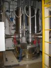 Used Niro Fluid Bed Dryer/Granulator, Model MP7-F1, Stainless Steel. Rated 10 bar maximum pressure, 1,610 liters. Includes a 75 hp blower, CIP system, air handling unit, Flanders air filtration unit,...