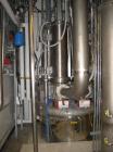 Used Niro Fluid Bed Dryer/Granulator, Model MP7-F1, Stainless Steel. Rated 10 bar maximum pressure, 1,610 liters. Includes a 75 hp blower, CIP system, air handling unit, Flanders air filtration unit,...