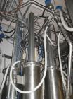 Used Niro Fluid Bed Dryer/Granulator, Model MP7-F1, Stainless Steel. Rated 10 bar maximum pressure, 1,610 liters. Includes a 75 hp blower, CIP system, air handling unit, Flanders air filtration unit,...