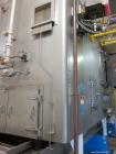 Used Wolverine Jetzone Fluidbed Dryer. Cleated Belt Stainless Steel. Approximate 36'' Wide. Serial No. 36