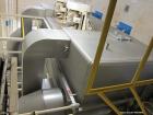 Used Wolverine Jetzone Fluidbed Dryer. Cleated Belt Stainless Steel. Approximate 36'' Wide. Serial No. 36