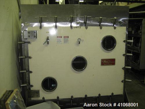 Used Hull Freeze Dryer, Model 72SF100. 6 shelves 36" x 48", 72 square feet. Temperature range of -55 deg C to +75 deg C. Ice capacity 100 kg total on two internal plate condensers. 460 volts @ 60 hz,...