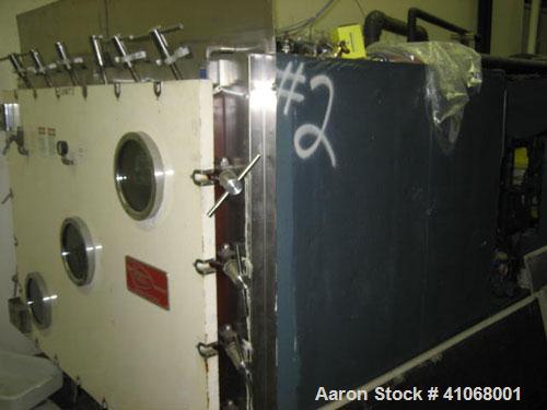 Used Hull Freeze Dryer, Model 72SF100. 6 shelves 36" x 48", 72 square feet. Temperature range of -55 deg C to +75 deg C. Ice capacity 100 kg total on two internal plate condensers. 460 volts @ 60 hz,...