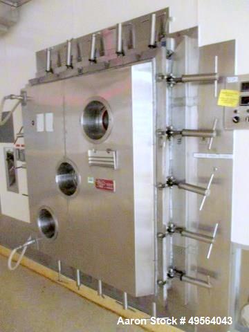 Used Hull Stainless Steel Freeze Dryer, Approximate 70 Cubic Feet (17 sq. ft.). Hull Control Panel and Shelf/Steam Controller Includes Stokes 212H-11 Microvac Pump Skid; and a 2 System Compressor Ski...