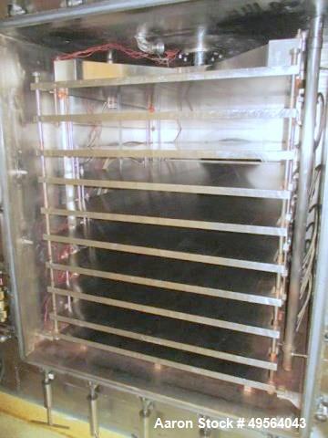 Used Hull Stainless Steel Freeze Dryer, Approximate 70 Cubic Feet (17 sq. ft.). Hull Control Panel and Shelf/Steam Controller Includes Stokes 212H-11 Microvac Pump Skid; and a 2 System Compressor Ski...
