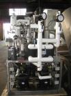 Used Edwards Lyophilizer, model Lyomax 1.0, 24sq.ft. total surface area, with stoppering, associated compressors,vacuum pump, control panel with Allen Bradley Panelview+ 1000 controls, serial# M92211...