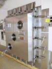 Used Hull Stainless Steel Freeze Dryer, Approximate 70 Cubic Feet (17 sq. ft.). Hull Control Panel and Shelf/Steam Controller Includes Stokes 212H-11 Microvac Pump Skid; and a 2 System Compressor Ski...