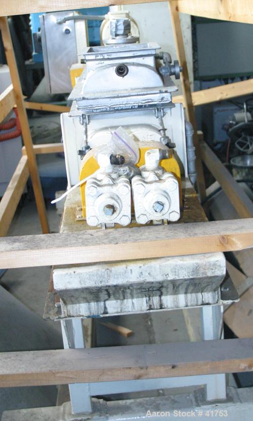 USED: Hollowscrew processor, 321 stainless steel. 2 cored screws,5" diameter x 36" long x 3" flight pitch. Carbon steel jacketed trough and top cover, rated for 25 psi hot oil service only. 7" x9-1/2...