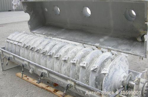 Used Reitz/Bepex Torus Disc Dryer, model TDJS-26-8, 304 stainless steel. Approximately 17 cubic feet working capacity. 24" diameter x 102" long x 4" spaced cored screw, rated 80 psi at 200 deg F, app...