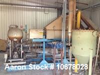 Used- Nara 1.6W Paddle Dryer. At 400 degrees C, it will process approximately 50kg hr. or at 200 degrees C, approximately 15...