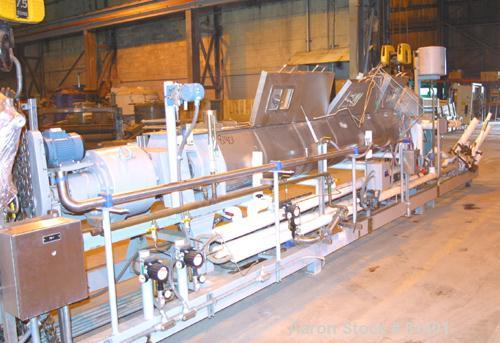USED: Niro twin shaft extractor, model A-640, 316 stainless steel. Jacketed chamber, (2) 4-1/2" diameter shafts, each with 4 rows of approx 10" wide continuous ribbons. Driven by a 1.3 kw motor with ...